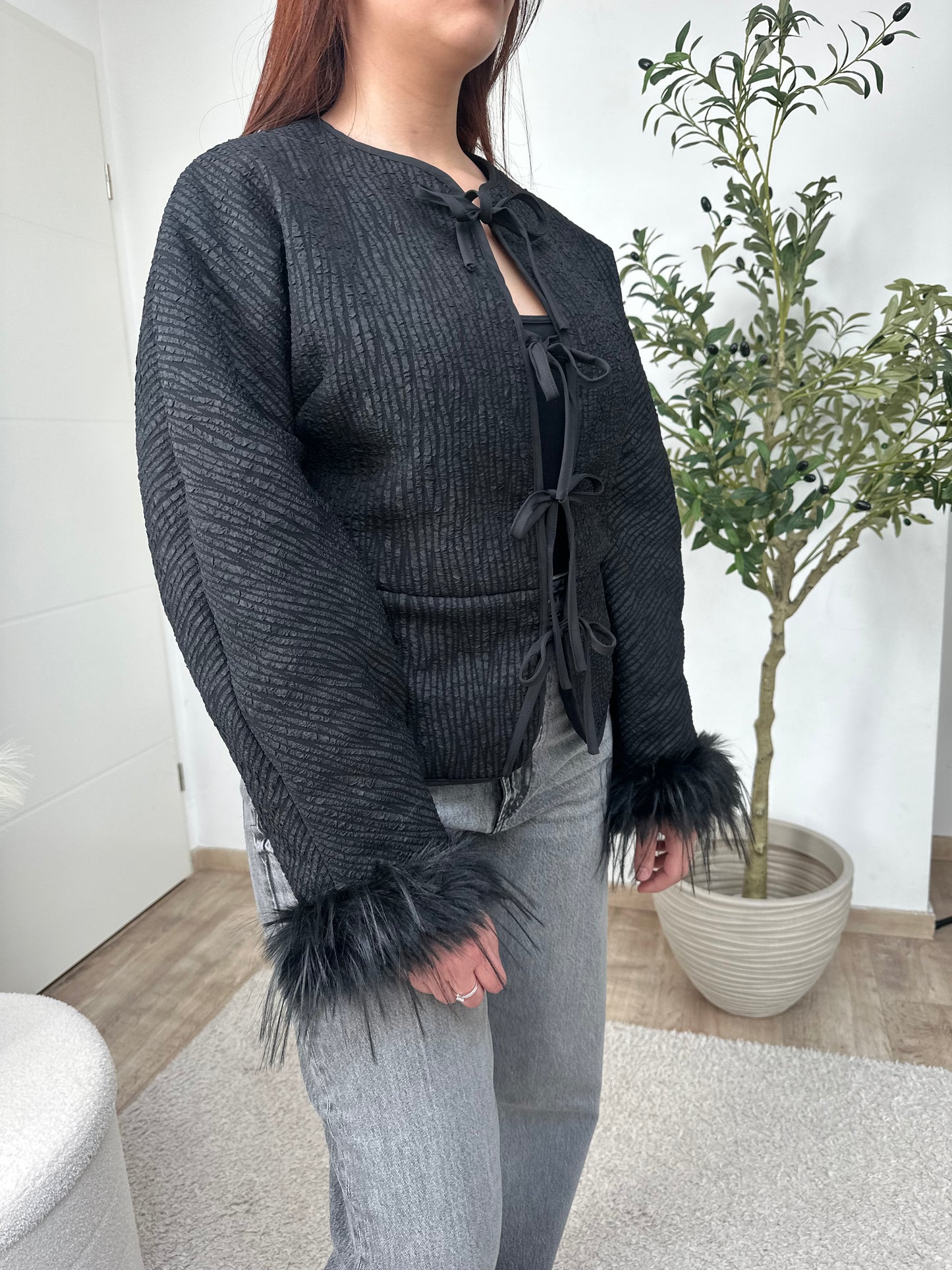 Veste noeuds plumé